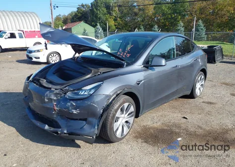 2023 Tesla Model Y from USA, damaged, VIN 7SAYGDEE1PA119472